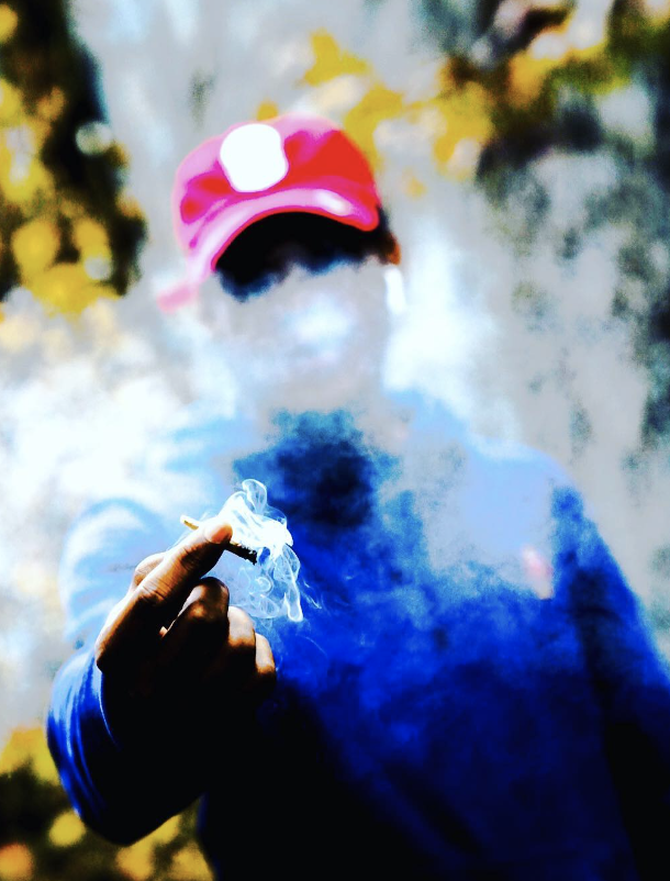 Fresh witha red cap smoking